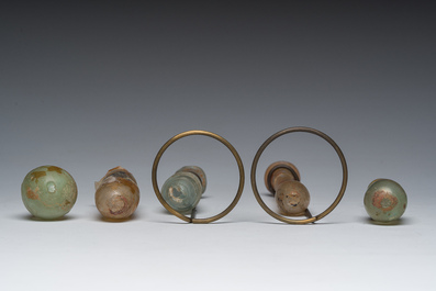 Nine small glass vases and bottles, Roman period and later