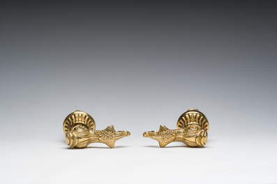 An Italian gilt bronze dolphin-shaped tap and two associated tap buckles, 20th C.