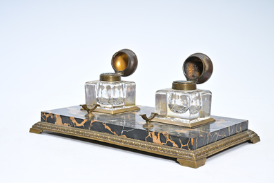 Milo (1955): A pair of bronze 'Retour d'Egypte' candlesticks and a bronze mounted marble ink stand, 19th/20th C.