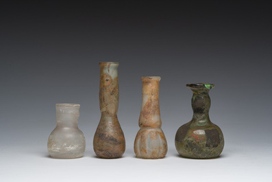Nine small glass vases and bottles, Roman period and later