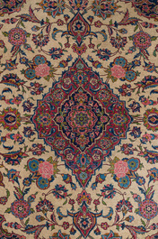 Two Persian rugs with floral design, Kashan and Kerman (Kirman), wool on cotton, 20th C.
