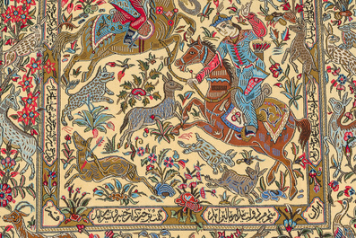 Een Perzische Qom (Qum/Ghom) tapijt met een jachtsc&egrave;ne, gesigneerd Beheshti, wol op katoen, 20ste eeuw