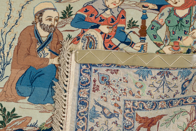 Two Persian rugs with narrative design, Tabriz and Isfahan, wool on cotton, 20th C.