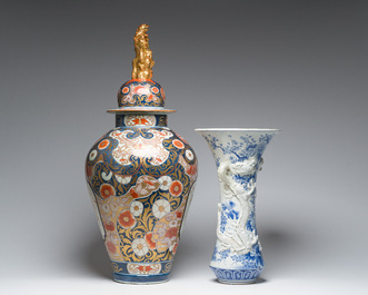 A Japanese blue and white Hirado vase with dragon relief design, an Imari vase and cover and a dish with floral design, Meiji, 19th/20th C.