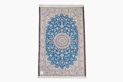 A Persian Nain rug with floral design, wool, cotton and silk, 20th C.