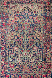 Two Persian rugs with floral design, Kashan and Kerman (Kirman), wool on cotton, 20th C.