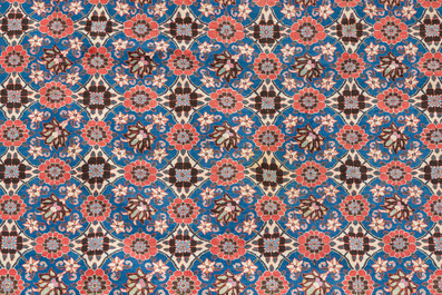 A Persian Varamin rug with floral design, wool on cotton, mid 20th C.