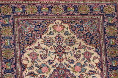 Two Persian rugs with floral design, Kashan and Kerman (Kirman), wool on cotton, 20th C.