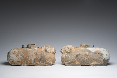 A pair of Chinese polychrome painted pottery ram-shaped vessels, Han dynasty