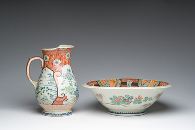 A Japanese Kutani pitcher and matching washbasin with floral design and landscapes, Meiji, 19th C.