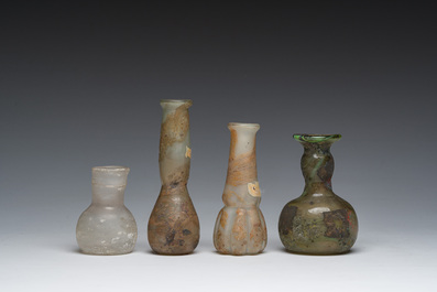 Nine small glass vases and bottles, Roman period and later