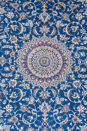 A Persian Nain rug with floral design, wool, cotton and silk, 20th C.