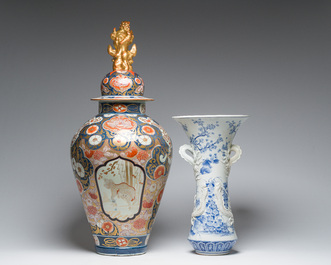 A Japanese blue and white Hirado vase with dragon relief design, an Imari vase and cover and a dish with floral design, Meiji, 19th/20th C.
