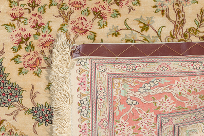 A Persian Qom (Qum/Ghom) silk rug with floral design, signed Mirmehdi, 20th C.