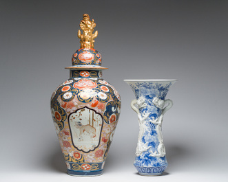 A Japanese blue and white Hirado vase with dragon relief design, an Imari vase and cover and a dish with floral design, Meiji, 19th/20th C.