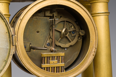 A French gilt bronze portico clock, 19th C.