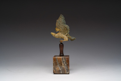 A Viennese polychrome cold painted bronze model of an eagle on a wooden and onyx marble base, 19th/20th C.