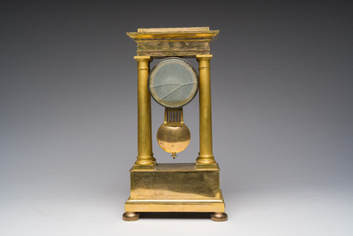 A French gilt bronze portico clock, 19th C.