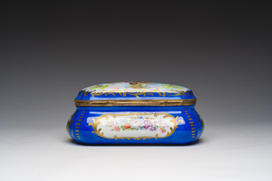 A French gilt and polychrome decorated jewelry box with amorous scenes and floral design, S&egrave;vres mark, 19th/20th C.