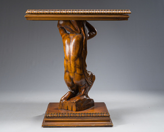 An Italian wooden console table in the shape of a kneeling man carrying a panel, second half 20th C.