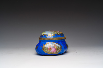 A French gilt and polychrome decorated jewelry box with amorous scenes and floral design, S&egrave;vres mark, 19th/20th C.