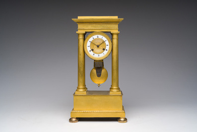A French gilt bronze portico clock, 19th C.