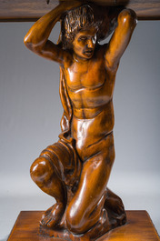 An Italian wooden console table in the shape of a kneeling man carrying a panel, second half 20th C.