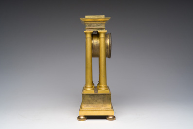 A French gilt bronze portico clock, 19th C.