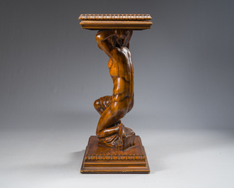 An Italian wooden console table in the shape of a kneeling man carrying a panel, second half 20th C.