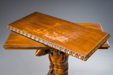 An Italian wooden console table in the shape of a kneeling man carrying a panel, second half 20th C.