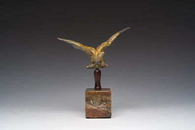 A Viennese polychrome cold painted bronze model of an eagle on a wooden and onyx marble base, 19th/20th C.