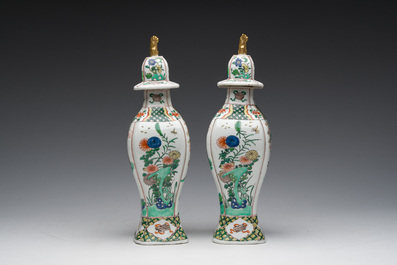 A pair of French Samson famille verte style 'mythical animals' vases and covers, Paris, 19th C.