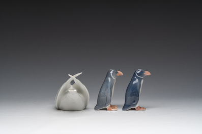 Three Danish Royal Copenhagen polychrome decorated porcelain models of an Arctic tern and penguins, 20th C.