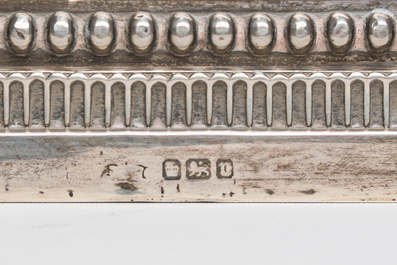 A pair of English silver Corinthian column-shaped candlesticks, maker's mark James Dixon &amp; Sons, Sheffield, dated 1906