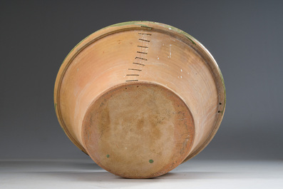 A French Proven&ccedil;al green-glazed 'tian' bowl, late 19th C.