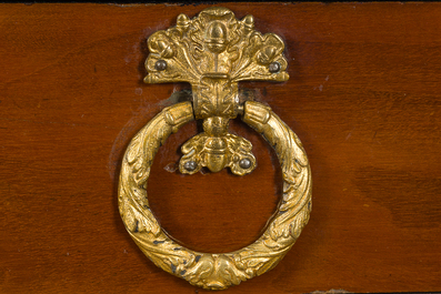 An imposing French Empire style gilt bronze mounted cherrywood dresser with a green marble top, 20th C.