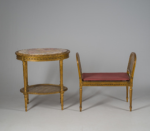 A French Louis XVI style eight-piece carved and gilt wooden salon set, 19th/20th C.