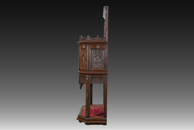 A French richly carved oak Neo-Renaissance credence with portrait miniatures, 19th C.