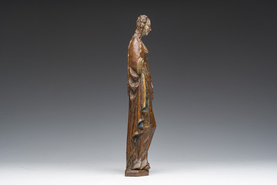 A Flemish carved, polychrome decorated and gilt oak sculpture of a female saint or 'Poup&eacute;e de Malines', 16th C.