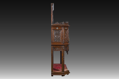 A French richly carved oak Neo-Renaissance credence with portrait miniatures, 19th C.