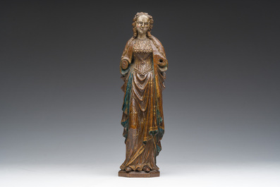 A Flemish carved, polychrome decorated and gilt oak sculpture of a female saint or 'Poup&eacute;e de Malines', 16th C.