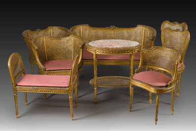 A French Louis XVI style eight-piece carved and gilt wooden salon set, 19th/20th C.