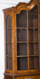 A large Louis XV style burl wood veneered wooden display cabinet with two glass doors and two drawers, ca. 1900