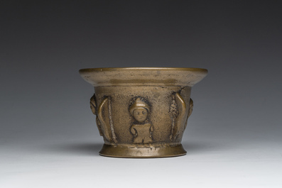 A French bronze mortar with relief design, 16th/17th C.