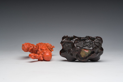 A Chinese red coral group with the 'Star God' Shou Xing and a lady, 19th/20th C.