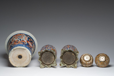 Two Japanese Satsuma bowls with animated scenes, an Imari jardini&egrave;re with floral design and two vases mounted into lamps, Meiji, 19th/20th C.