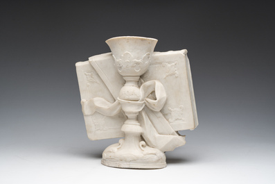 A French white marble sculpture of a chalice resting on a book, 18th/19th C.