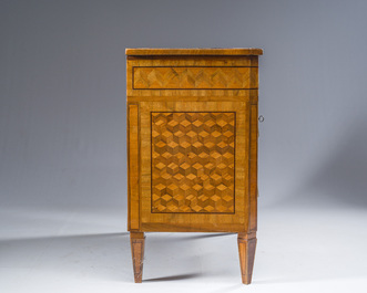 A French Louis XVI style bronze mounted parquetry veneered wooden chest of drawers, 19th C.