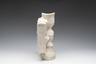 A French white marble sculpture of a chalice resting on a book, 18th/19th C.