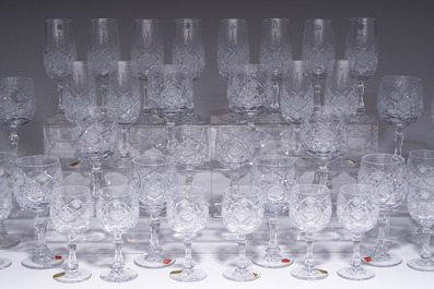 A French 48-piece collection of colourless crystal glasses with etched design, Bayel, 20th C.